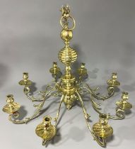 A very large Dutch style eight branch heavy gage brass chandelier, all arms detached (1)