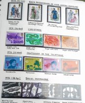 A collection of stamps in three albums with a good set of 1960's - 70's mint GB including pairs.