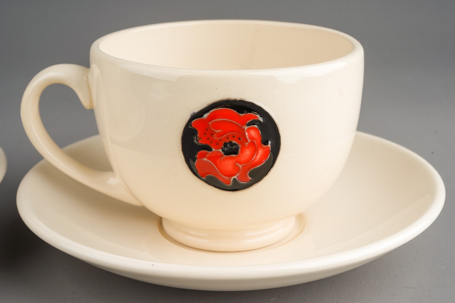 A Moorcroft Flamminium Revival pattern poppy two cups and saucers . Designed by Emma Bossons - Image 2 of 7