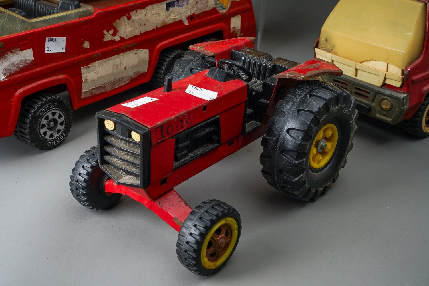 Tonka Toys. Four large scale vehicles - tractor, fire engine, dump truck and cement mixer, all - Image 3 of 5