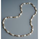 A 9ct gold and pearl necklace and bracelet, set with alternate pearls and gold coloured beads, the