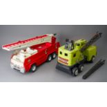 Tonka Toys. A large scale fire engine missing one ladder with a green Power House Earthmovers