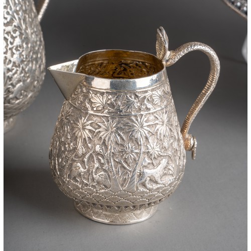 Late 19th century Indian Kutch silver three-piece tea set. The tea pot and jug have handles in the - Image 3 of 8