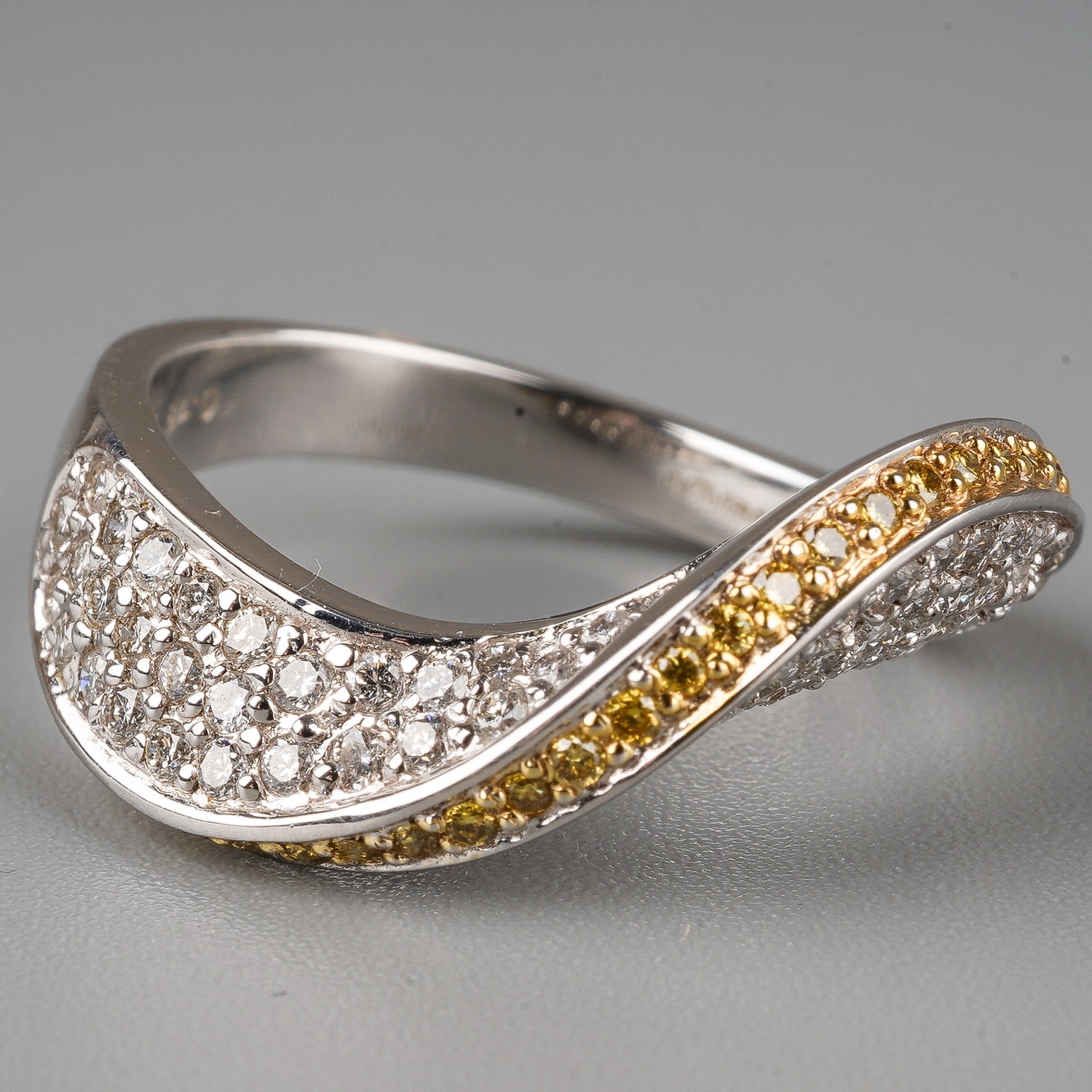 An 18ct white gold yellow and white diamond dress ring, set with a wave of yellow round-brilliant - Image 4 of 7
