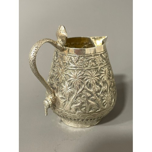 Late 19th century Indian Kutch silver three-piece tea set. The tea pot and jug have handles in the - Image 6 of 8