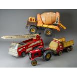 Tonka Toys. Four large scale vehicles - tractor, fire engine, dump truck and cement mixer, all