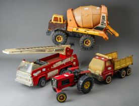 Tonka Toys. Four large scale vehicles - tractor, fire engine, dump truck and cement mixer, all