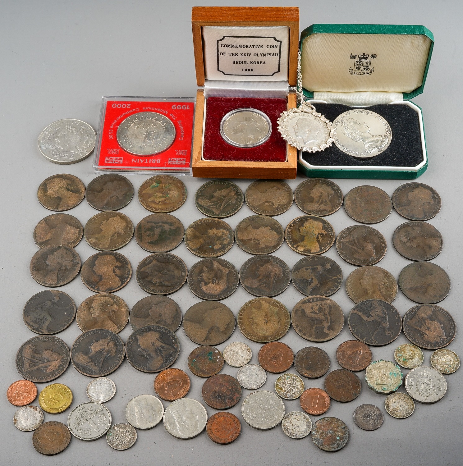 A quantity of coins, including Victorian and later pennies, pre and post 1947, commemorative £5