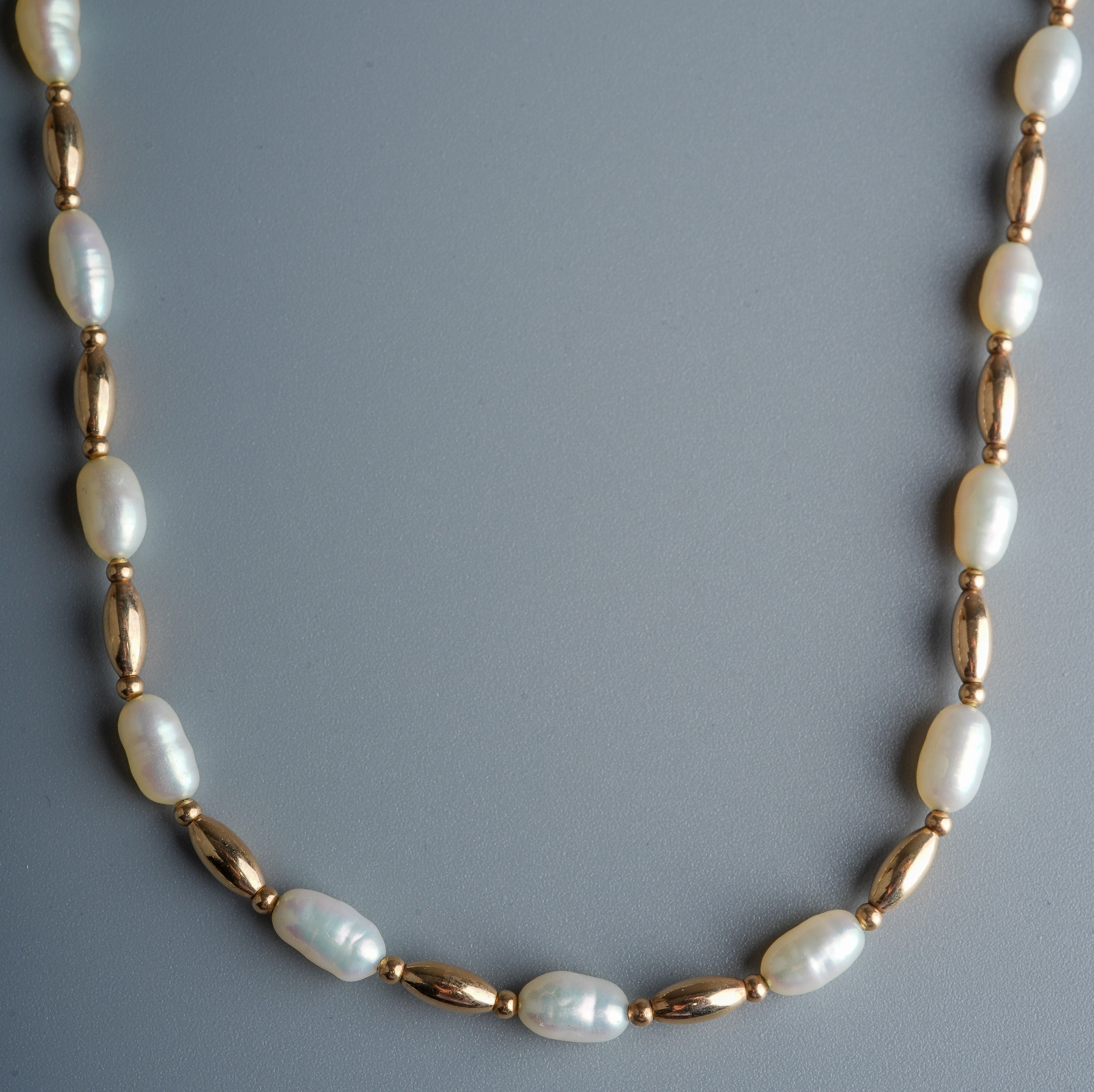 A 9ct gold and pearl necklace and bracelet, set with alternate pearls and gold coloured beads, the - Image 2 of 4