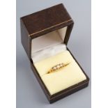 A yellow gold and diamond five-stone ring, set with graduated old-cut diamonds, size Q1/2,