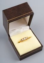A yellow gold and diamond five-stone ring, set with graduated old-cut diamonds, size Q1/2,