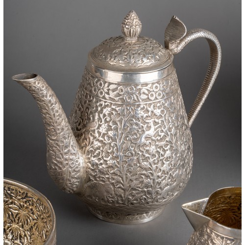 Late 19th century Indian Kutch silver three-piece tea set. The tea pot and jug have handles in the - Image 2 of 8