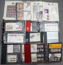 A selection of stamp albums to include World Stars of Stage and Screen, a World Wildlife album, 5
