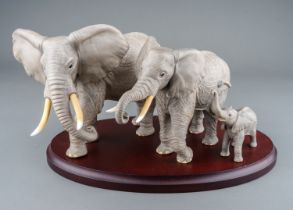 A Lennox porcelain African Elephant family group from African Wilderness Collection, boxed