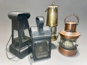 An Eccles Type 6 M & O miner's lamp together with a Meteor Masthead ships lantern and two tin