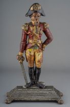 A Coalbrookedale style enamelled cast iron door stop in the form of the Duke of Wellington on