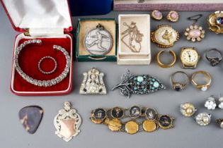 A collection of costume, including brooches, earrings, faux pearls, Art Deco, football medals,