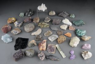 Two trays of mineral samples, stones, fossils etc