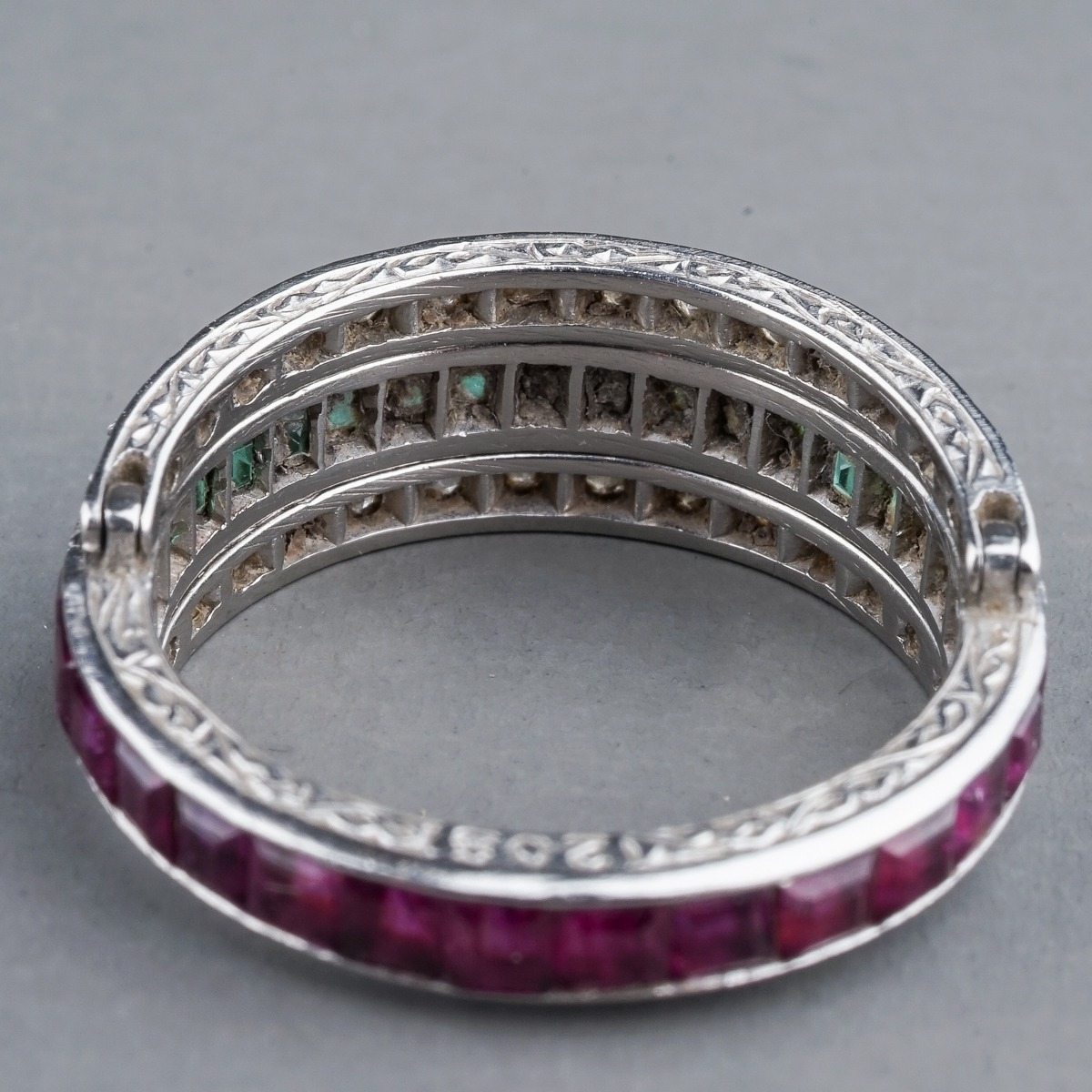 An Art Deco platinum diamond ruby and emerald swivel or flip ring, set with calibre cut rubies and - Image 5 of 6