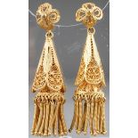 A pair of 19th century yellow metal filigree earrings, tapered conical drops with tassels, hook