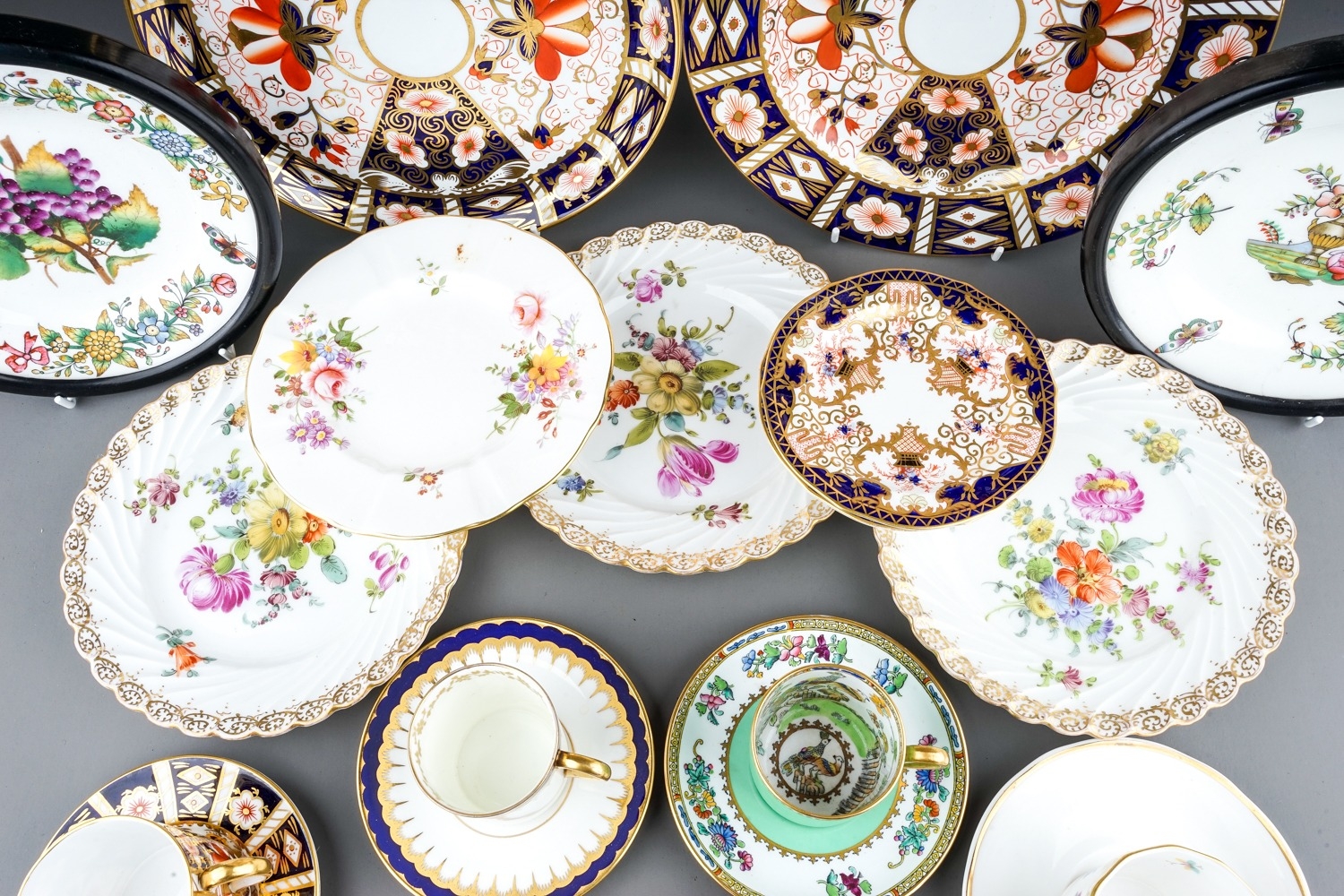 A collection of ceramics to include Dresden porcelain plates, Royal Crown Derby plates, cups, - Image 11 of 20