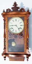 A late 19th Century American style inlaid mahogany cased wall clock, cream dial with Roman Numerals,