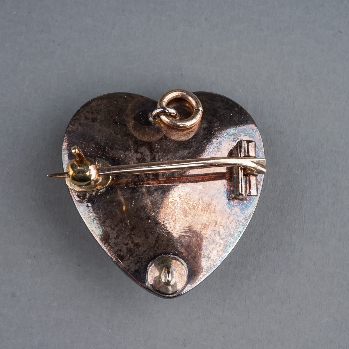 A late 19th century diamond and enamel heart shaped brooch/pendant, the blue enamel heart set with - Image 3 of 3