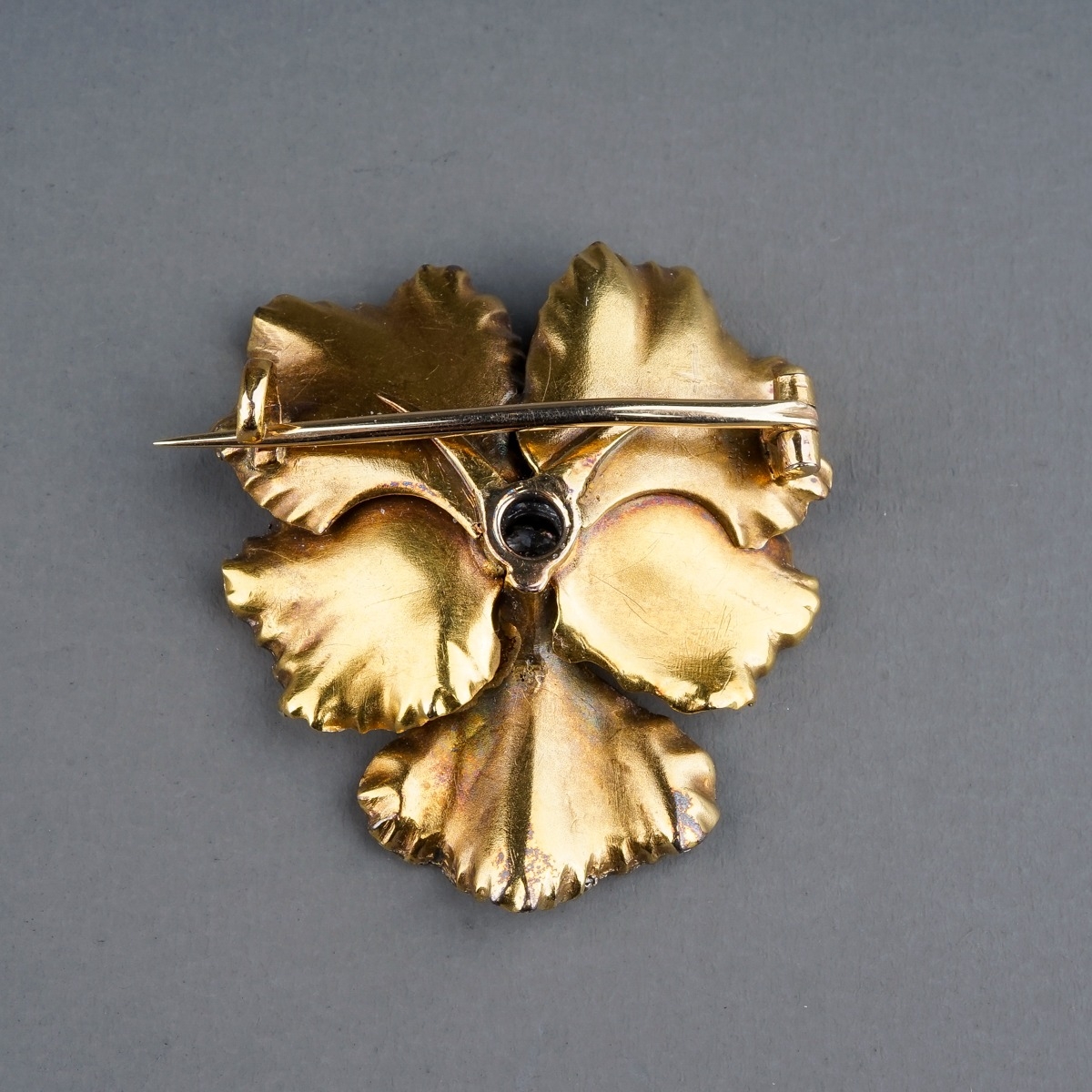 A Victorian enamel and diamond pansy brooch, set with an old-cut diamond in polychrome enamel - Image 3 of 3