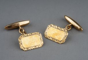 A pair of 9ct yellow gold cufflinks, canted rectangular with chased border, hallmarked Birmingham