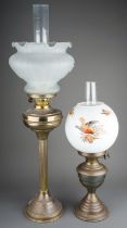 Two early 20th Century oil lamps, one Duplex, the other with column stem and globular shade