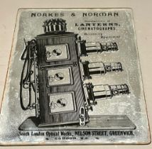 An early 20th Century Noakes & Norman Manufacturer of Lanterns Cinematographs printed mirror
