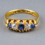 A Victorian 18ct yellow gold sapphire and diamond five-stone ring, size M1/2, Chester 1881, gross