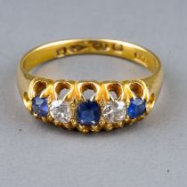A Victorian 18ct yellow gold sapphire and diamond five-stone ring, size M1/2, Chester 1881, gross