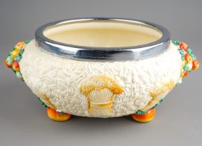 Clarice Cliff: an early 20th century Celtic Harvest bowl, the textured bowl with protruding fruit