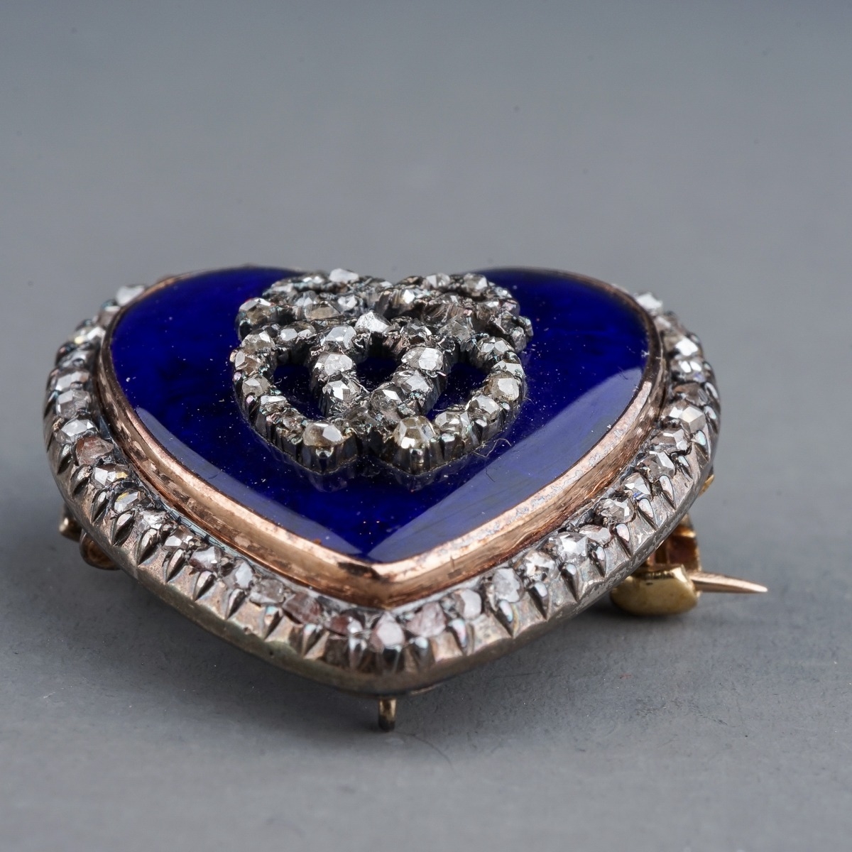 A late 19th century diamond and enamel heart shaped brooch/pendant, the blue enamel heart set with - Image 2 of 3