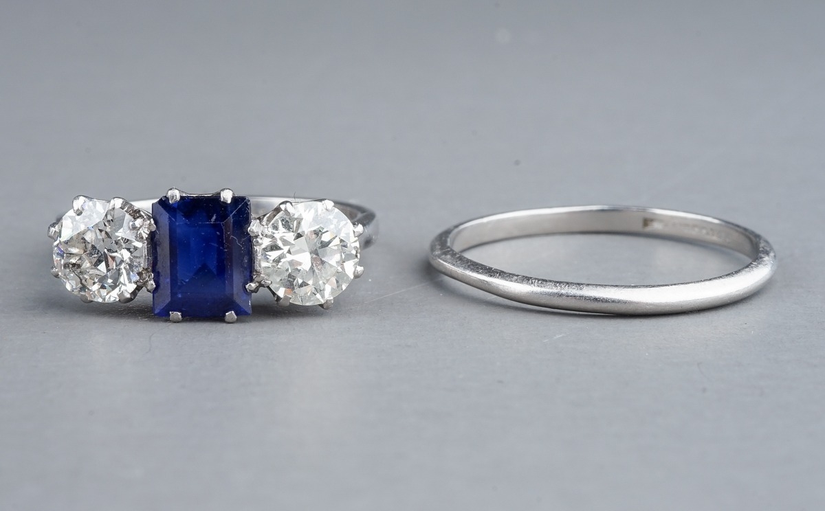 An early 20th century platinum diamond and sapphire three-stone ring, the rectangular-cut sapphire - Image 3 of 6
