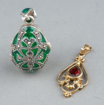 A 9ct yellow gold and garnet pendant, gross weight approx 1g; together with a silver and green glass