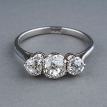 A platinum and diamond three stone ring, set with old-cut diamonds, estimated total diamond weight