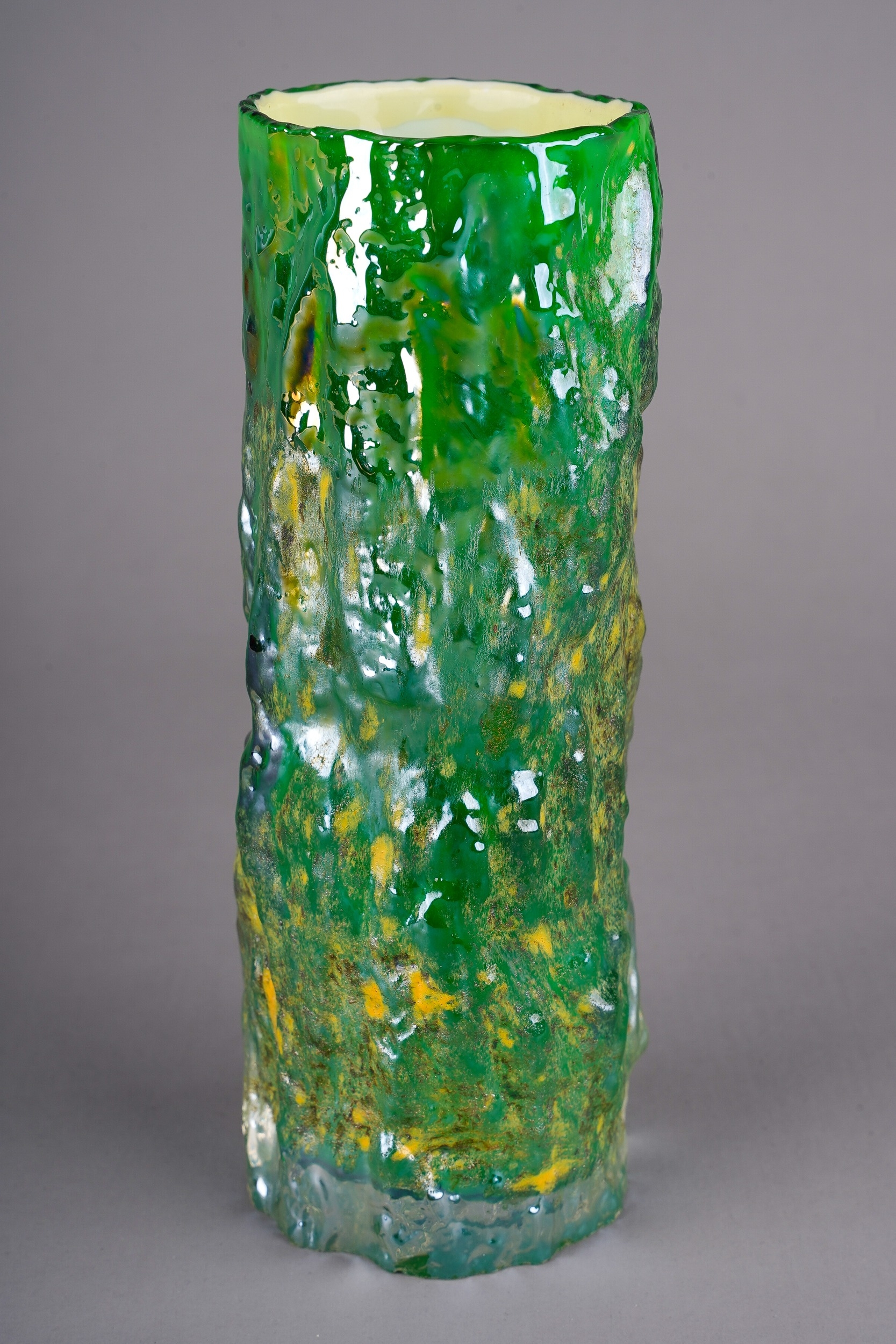 A green lustre glass textured bark vase in the manner of Geoffrey Baxter for Whitefriars, approx