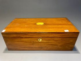 A Victorian style slopefront writing box, brass fittings and carrying handles with fitted