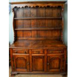 Large oak Welsh dresser with 3 draw and 3 door base, H hinges and brass handles