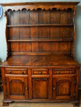 Large oak Welsh dresser with 3 draw and 3 door base, H hinges and brass handles