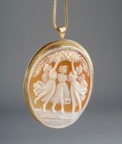 An 9ct yellow gold and shell oval cameo brooch, carved depicting three maidens, approx 5.5cm over