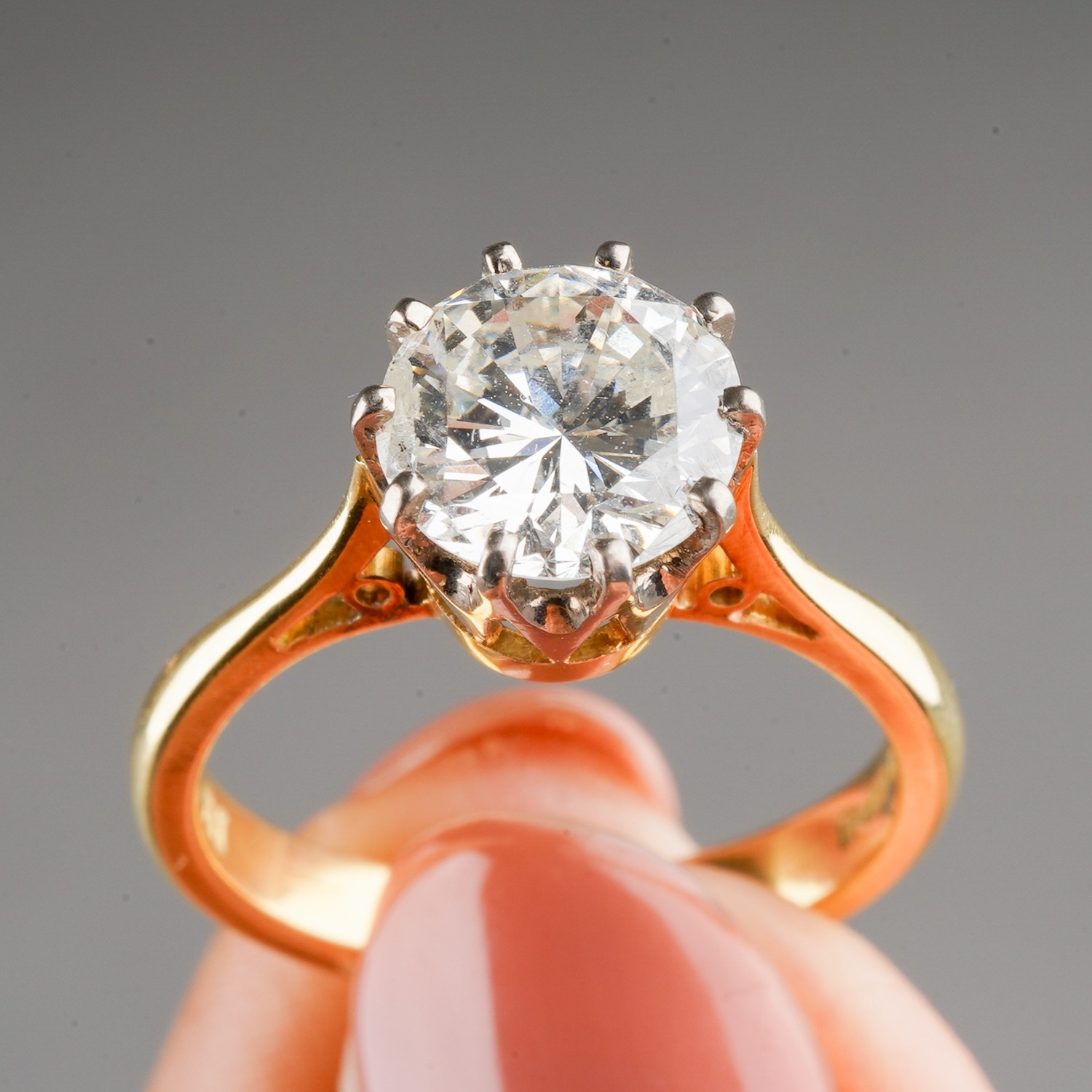An 18ct yellow gold and diamond solitaire ring, the round brilliant-cut diamond approx 1.5cts, - Image 7 of 8