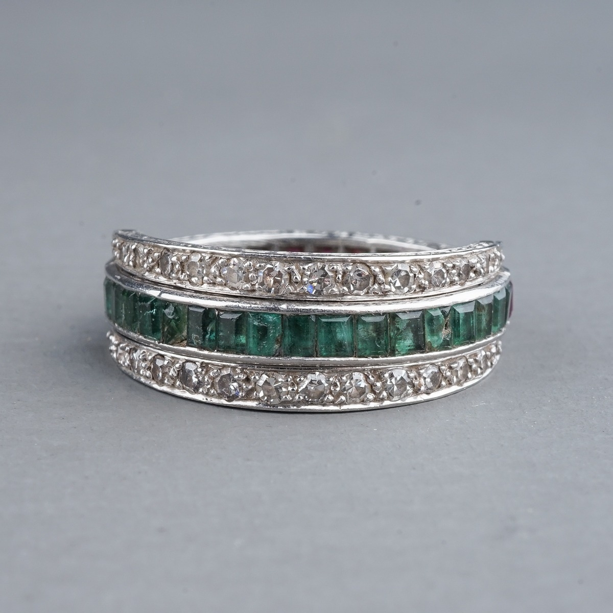 An Art Deco platinum diamond ruby and emerald swivel or flip ring, set with calibre cut rubies and - Image 3 of 6