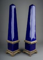 A pair of 20th Century cobalt blue porcelain and gilt metal mounted decorative Obelisks on raised