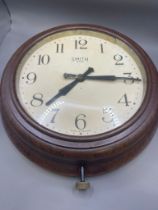 A bakelite Smiths 8 Day Wall Clock with clockwork movements