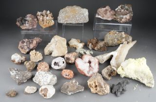 Two trays of rock samples with crystal
