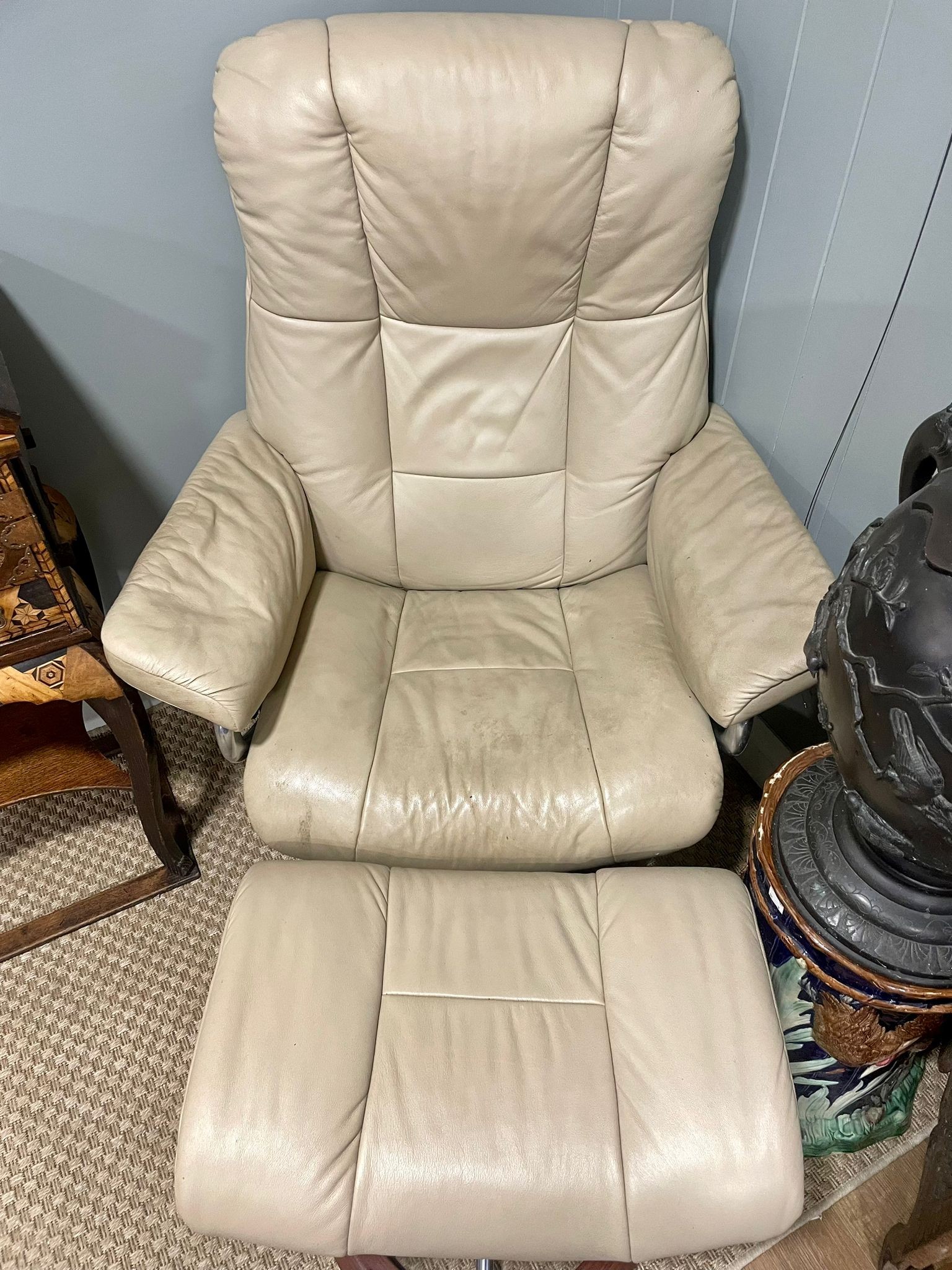 A retro mid 20th century stressless reclining swivel armchair and foot stool. Having a rectangular - Image 5 of 5