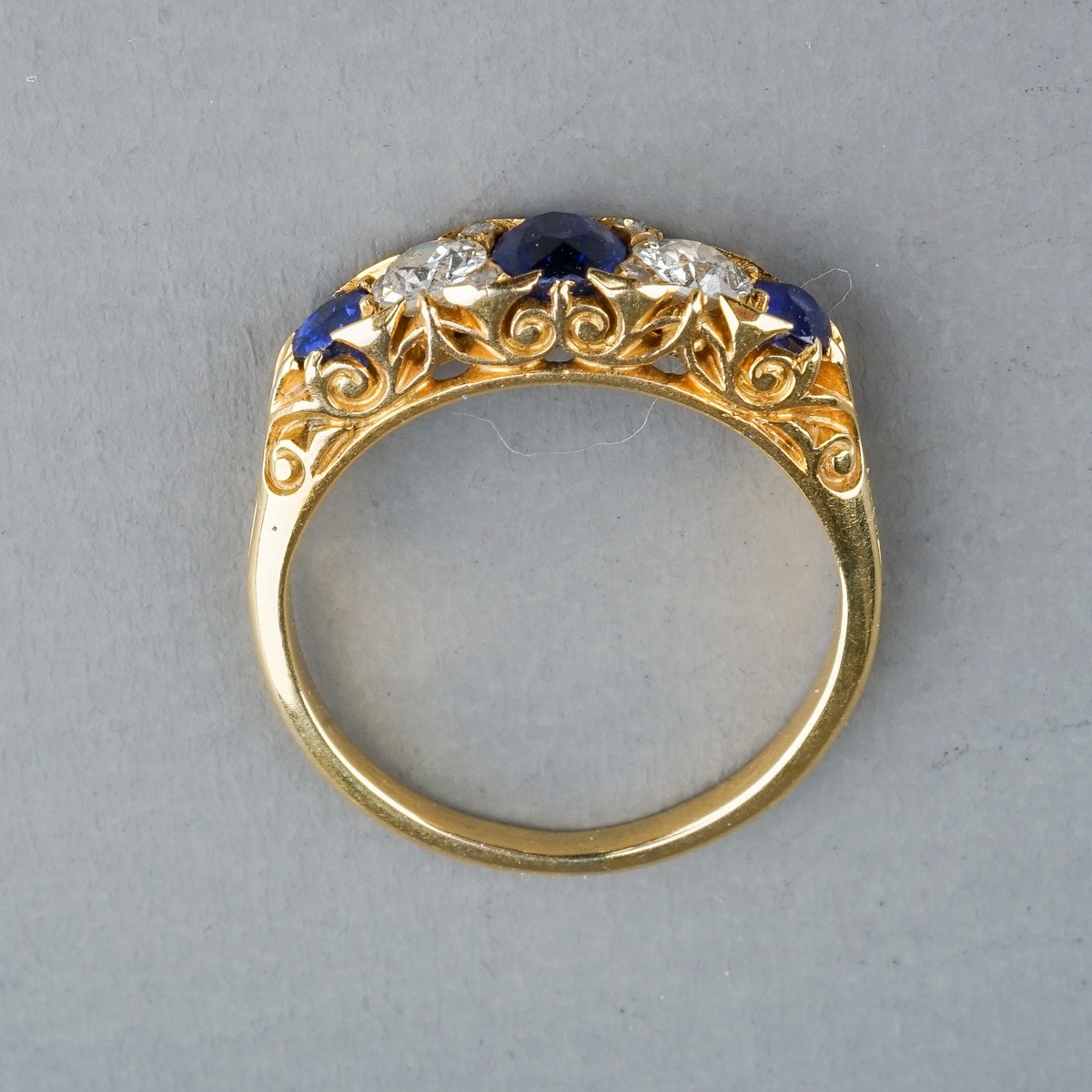 An Edwardian yellow gold sapphire and diamond five-stone ring, size L, unmarked assessed as approx - Image 3 of 4